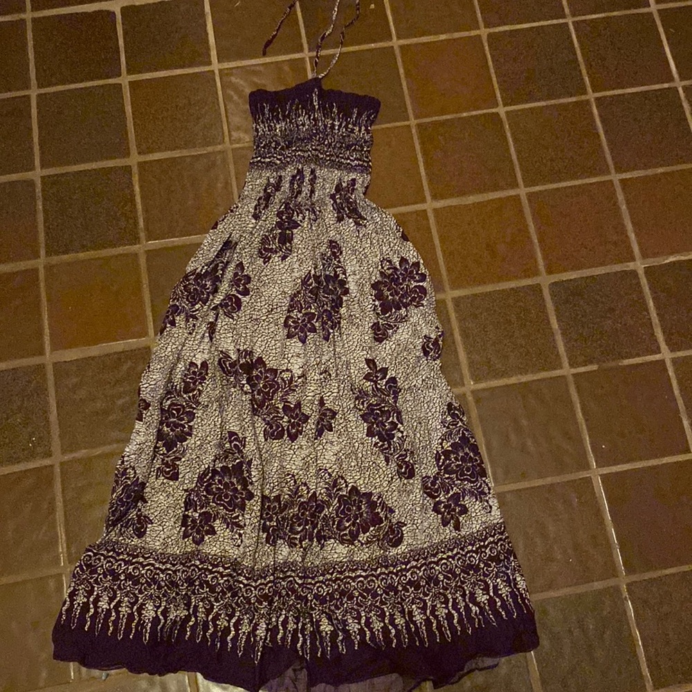 Purple dress, scrunch top stretches and bottom is flowy.